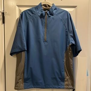 Like new TGW 1/4 zip rain jacket. Medium